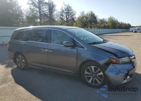 2014 Honda Odyssey Touring z USA, uszkodzony, nr VIN 5FNRL5H92EB022136